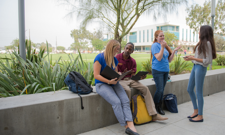 Students in front of Loker Student Union chatting